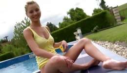 Blonde lovebird is following to a pool and she is lustful her hairless pussy